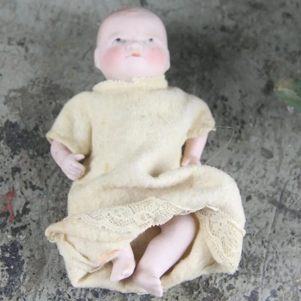 Antique One-Of-A-Kind Miniature China Doll in Wicker Cradle